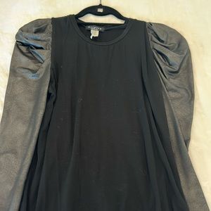 Black top with leather puffy sleeve
